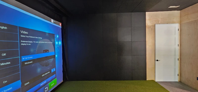 Panel finish continuing from the simulator screen onto an adjacent wall