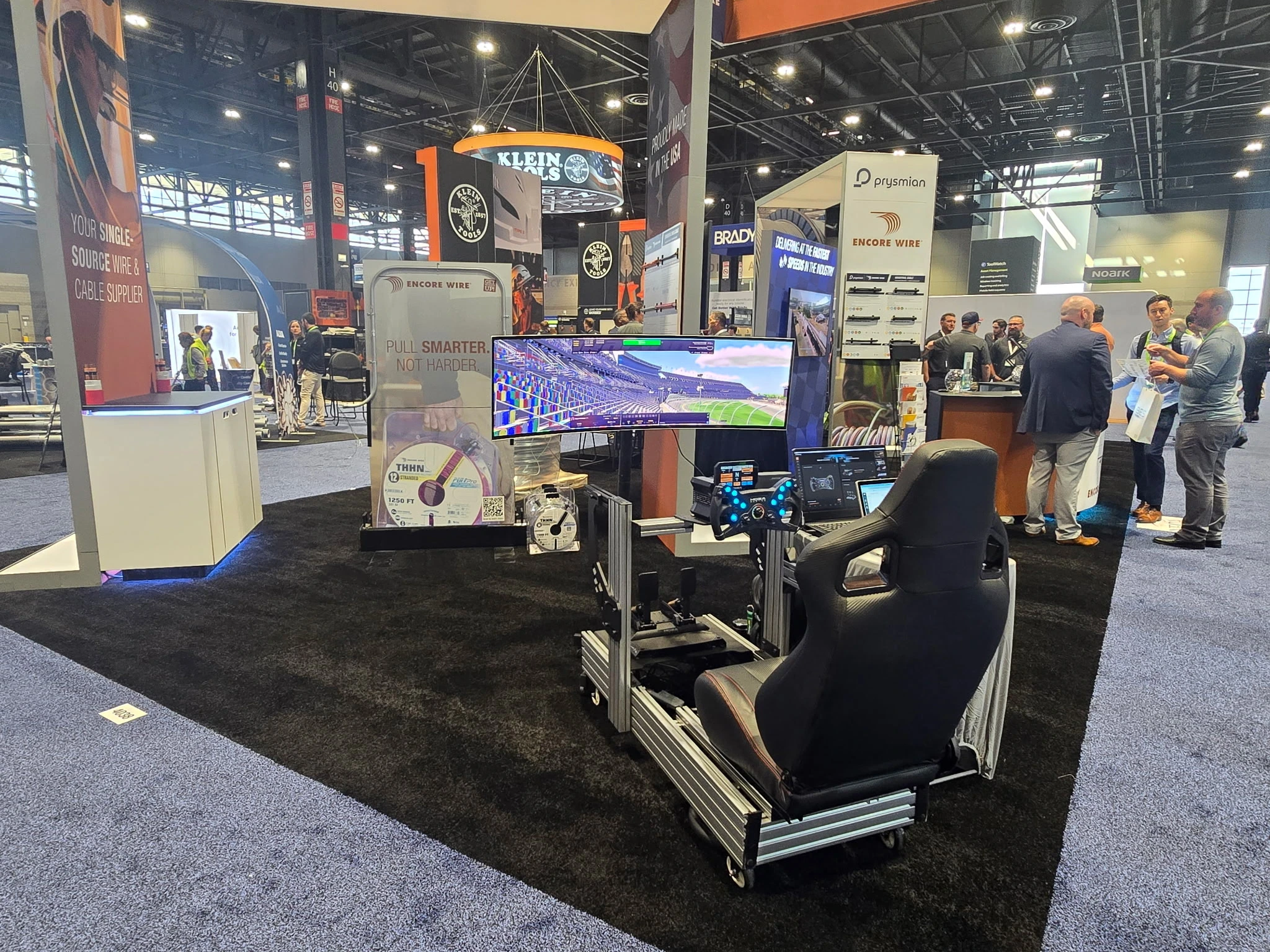 Racing simulator chair and display at a trade show